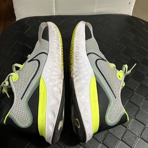 Nike size 10, grey colour with a touch of lemon green and black